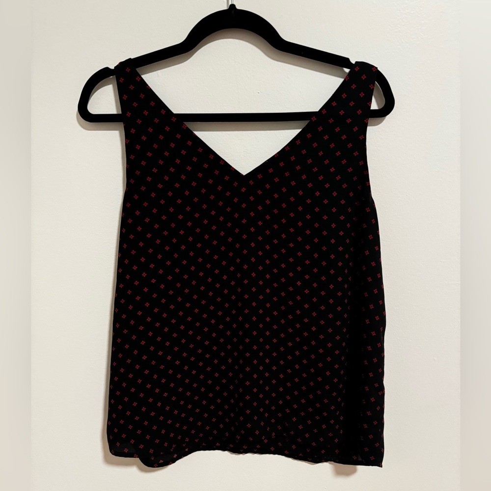 Black tank blouse with red stars with crossed back